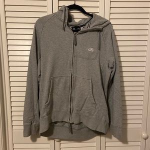 Grey Nike zip up.